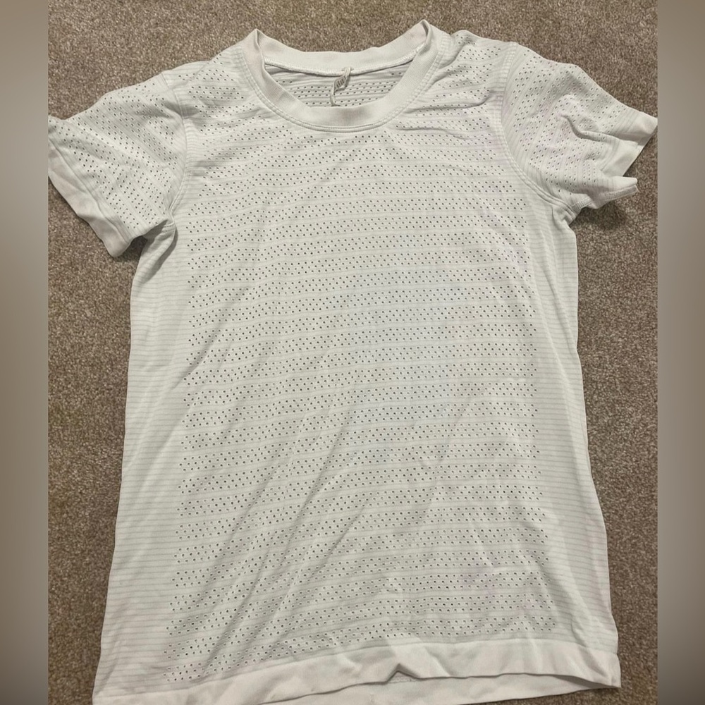 White lululemon shirt w little holes